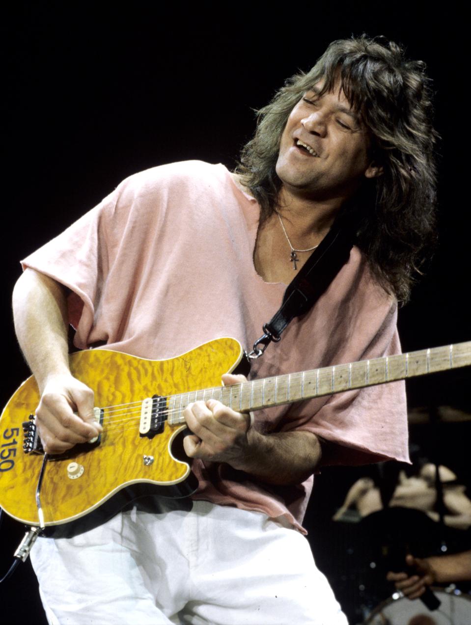 eddie van halen cigarette holder Eddie Van Halen Has Died From Throat Cancer