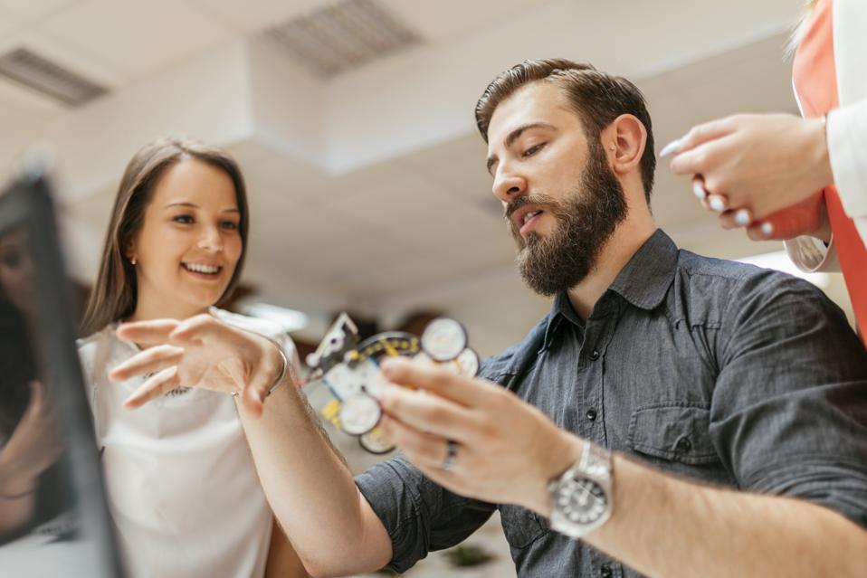 Colleagues discussing new product