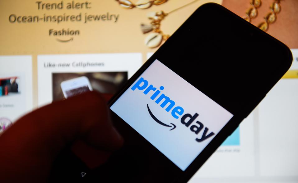 In this photo illustration an Amazon Prime day logo seen...
