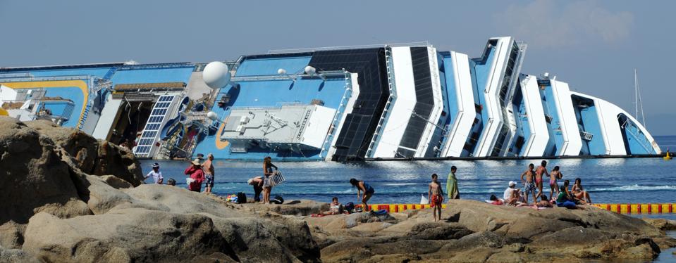 View Of The Wreckage Of Capsized Cruise Liner Costa Concordia At Giglio Island
