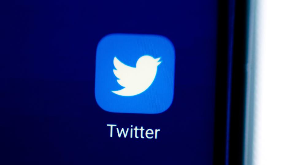 In this photo illustration an icon of Twitter app displayed...