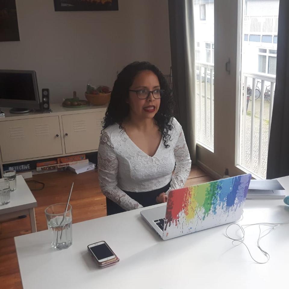 Kristhell Lopez defends her PhD over video conference.