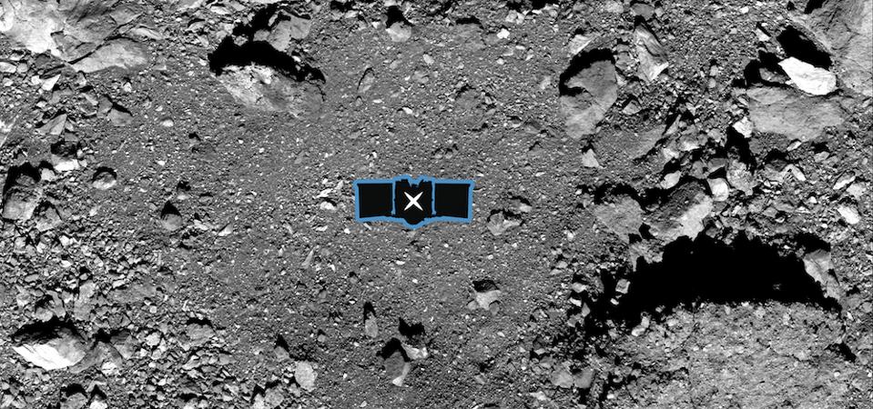 This image shows sample site Nightingale, OSIRIS-REx’s primary sample collection site on asteroid Bennu. The image is overlaid with a graphic of the OSIRIS-REx spacecraft to illustrate the scale of the site.