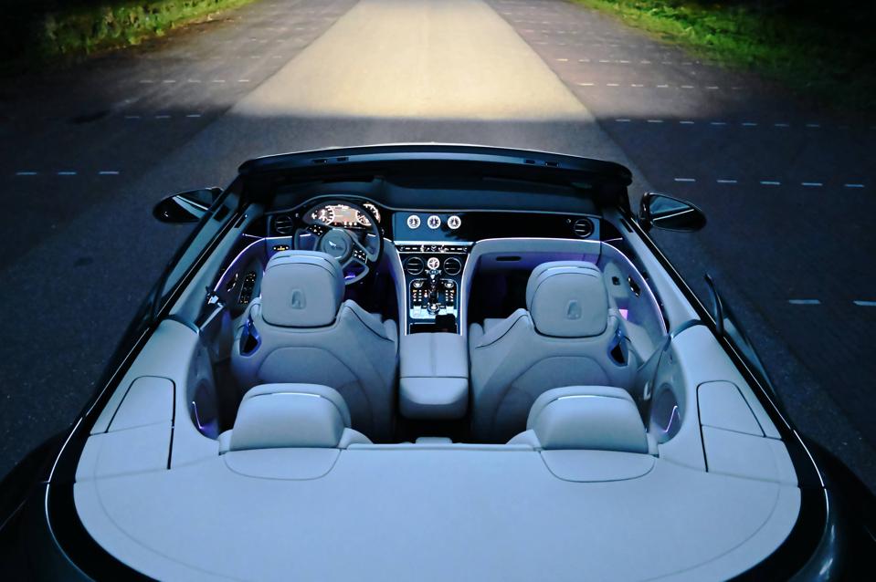 The beige interior with lit purple interior lights