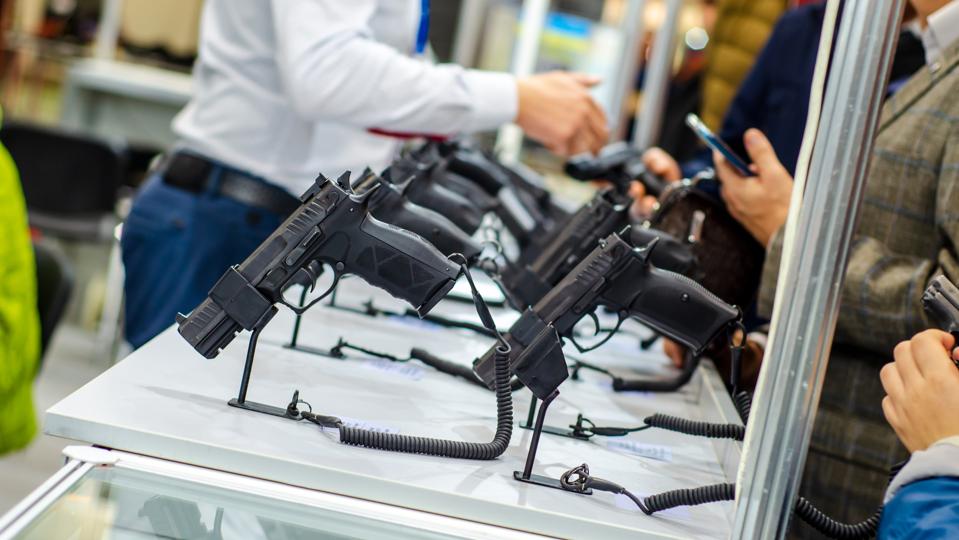 Gun Display Stands. Pistols for sale in the store.