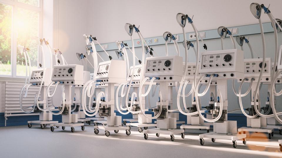 Many ventilators and respirators in stock in a clinic warehouse during coronavirus epidemic - medical concept image