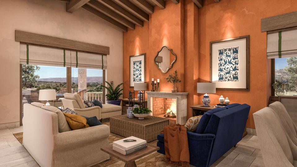 Living room with fireplace and patio.