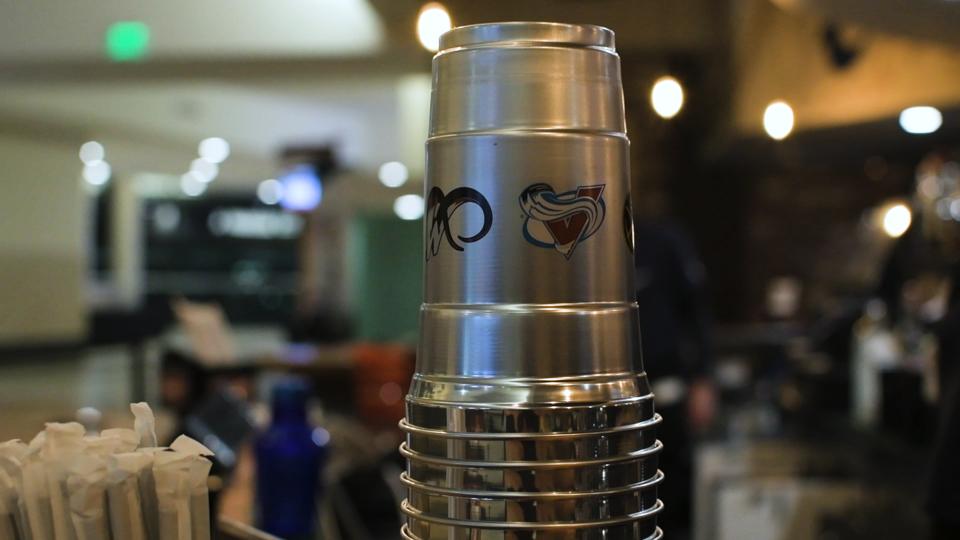Stack of Colorado Avalanche-branded Ball aluminum cups.