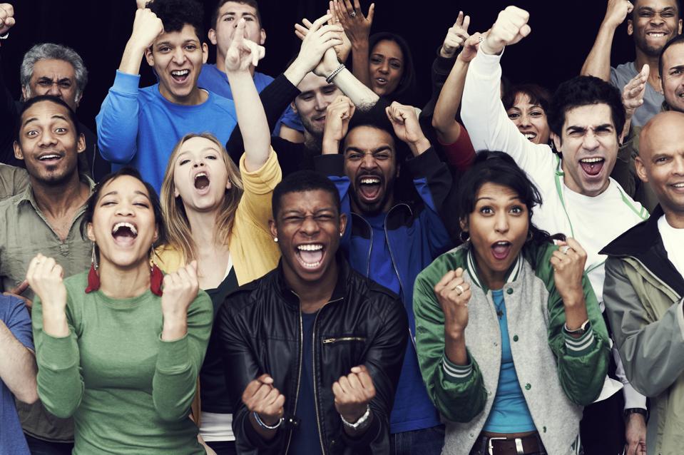 Crowd of sports fans cheering