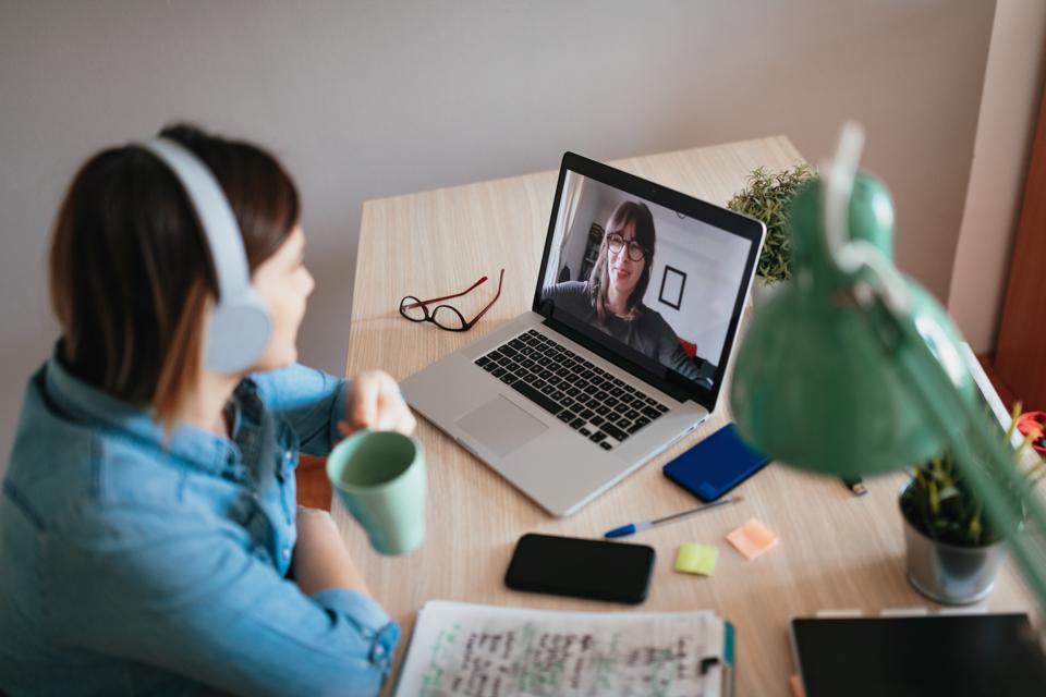 Business woman having online business meeting