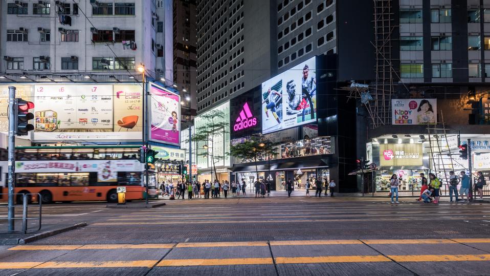 Crossroads in Hong Kong at night.