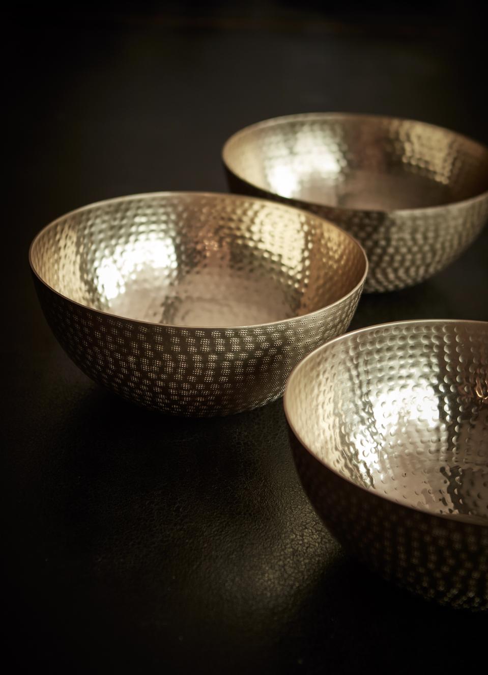 Bronze bowls with a unique handcrafted texture.