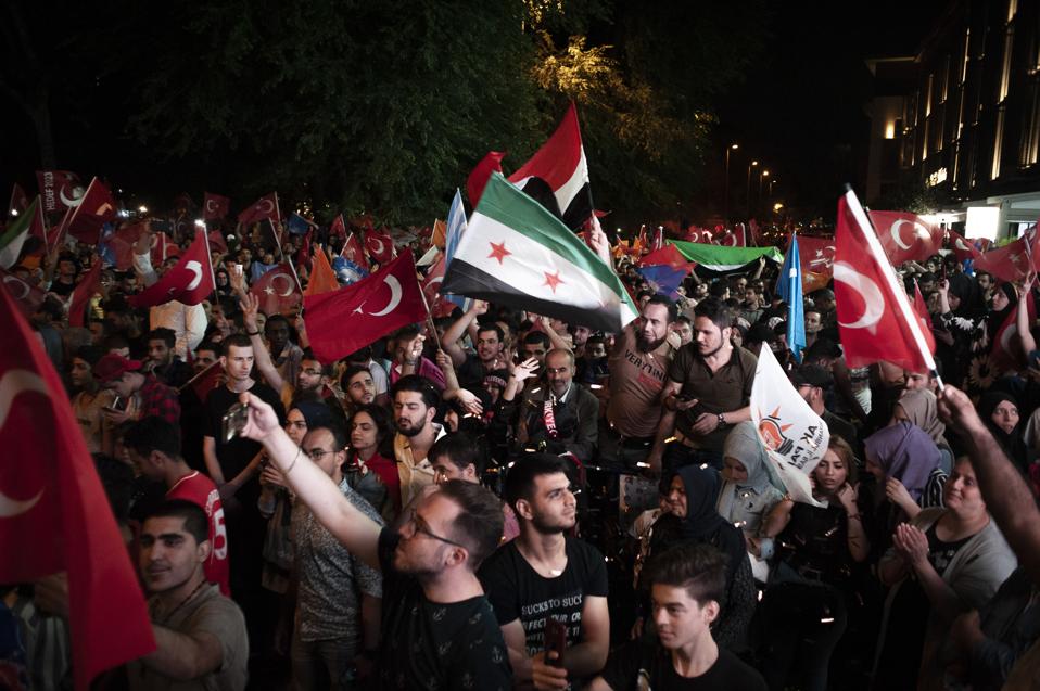Supporters of President Recepp Tayyip Erdogan in Fatih wave...