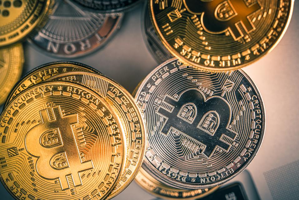 Close Up Of Crypto Money Placed On Table.