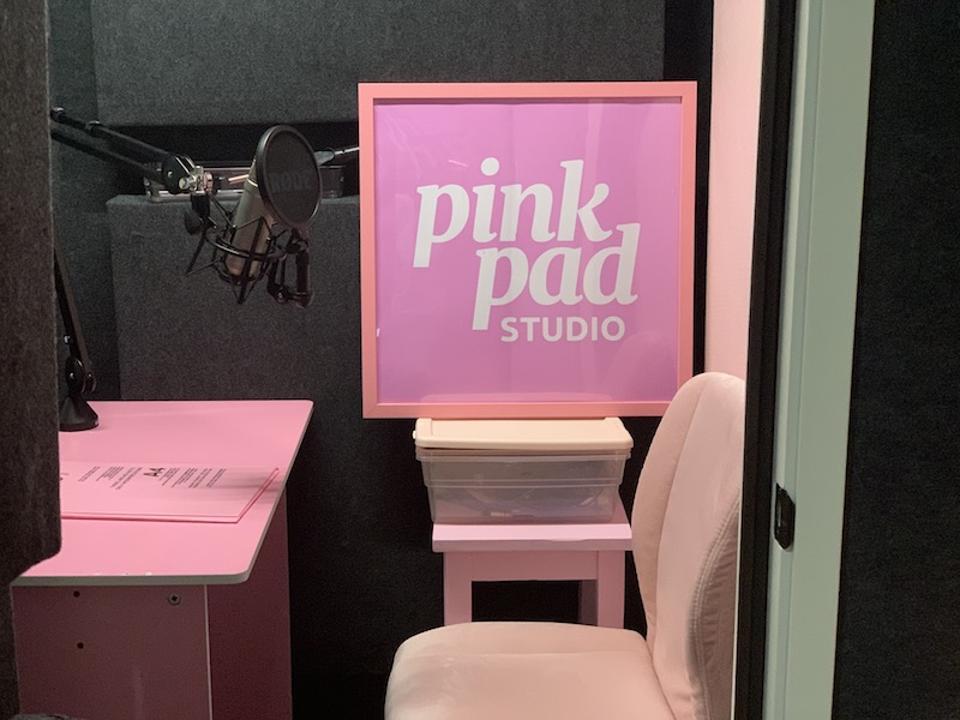 pink podcast studio with pink chair and pink desk