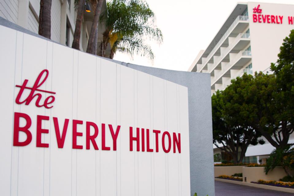 The Beverly Hilton's exterior, with the name in large red lettering