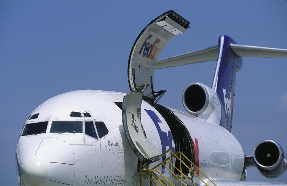 Loading door open on FedEx Boeing 727-100F parked named