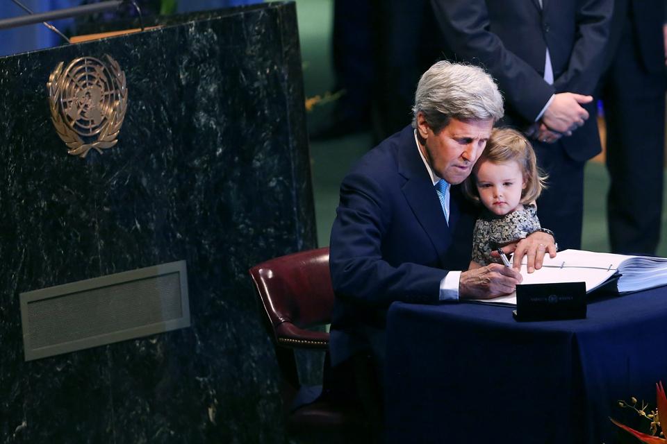 22 Apr 2016: U.S. Secretary of State John Kerry holds his two year-old grand daughter Isabel Dobbs-Higginson for the signing of the accord at the United Nations Signing Ceremony for the Paris Agreement on Climate Change.