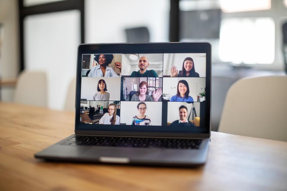 Colleagues having a work meeting through a video call