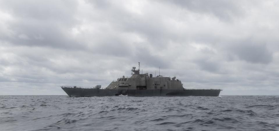 A Freedom Class Littoral Combat Ship sails in murky weather.