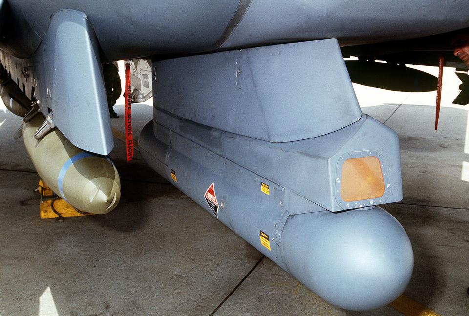 LANTIRN navigation/targeting pod mounted under the wing of an F-15E strike jet.