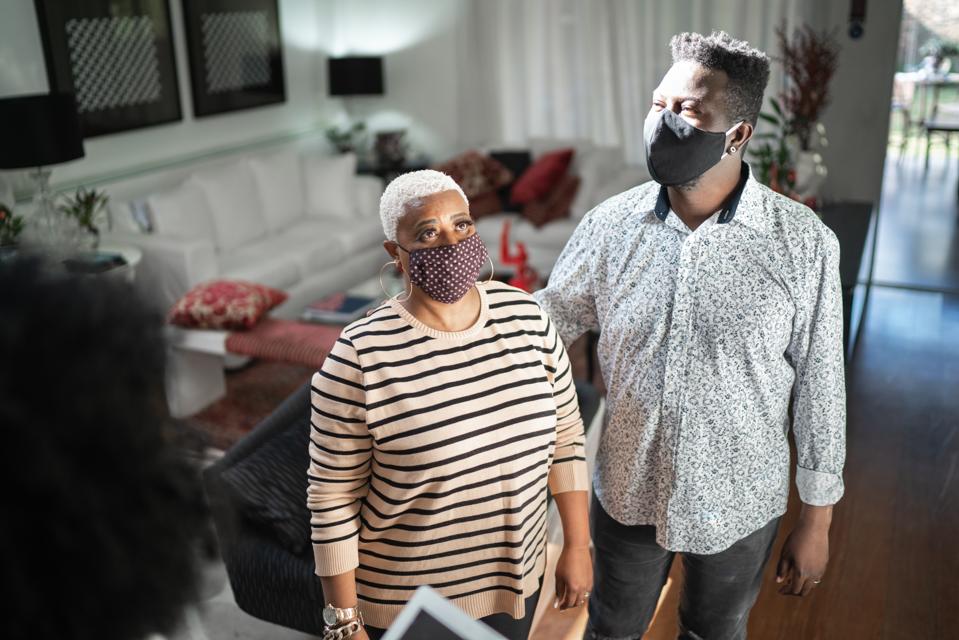 Couple visiting a house on sale