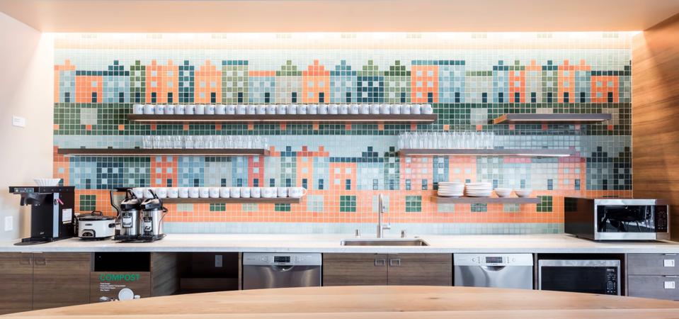Fireclay Tile installation of 2x2 tiles in a rainbow of colors at Salesforce East in San Francisco