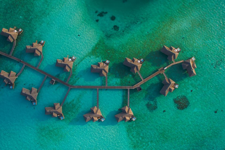Aerial view of pier houses in the Maldives.