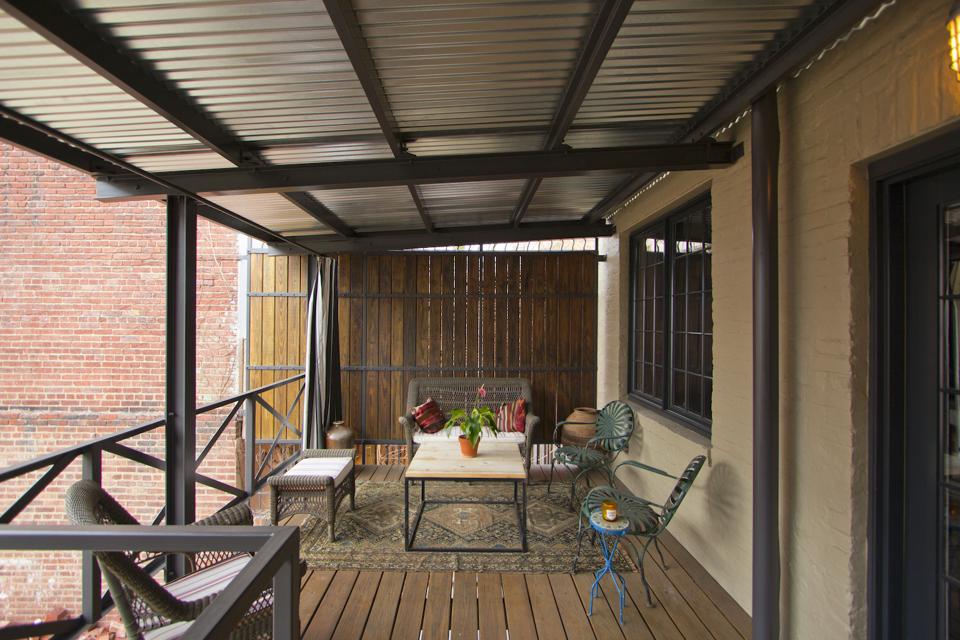 The second floor porch was retained, although the railing and the roof were replaced.