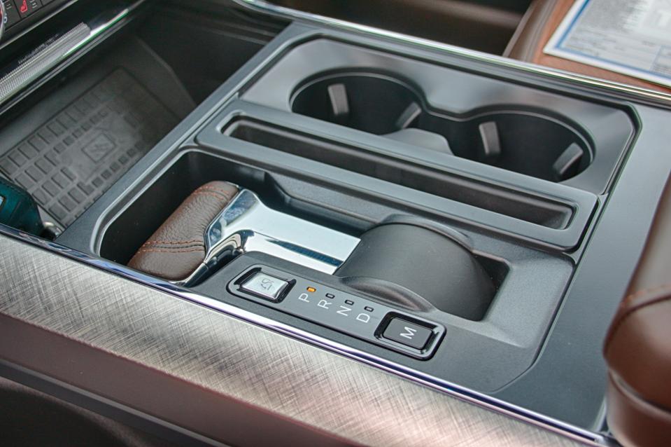 2021 Ford F-150 console mounted shifter folds flat to enable work surface