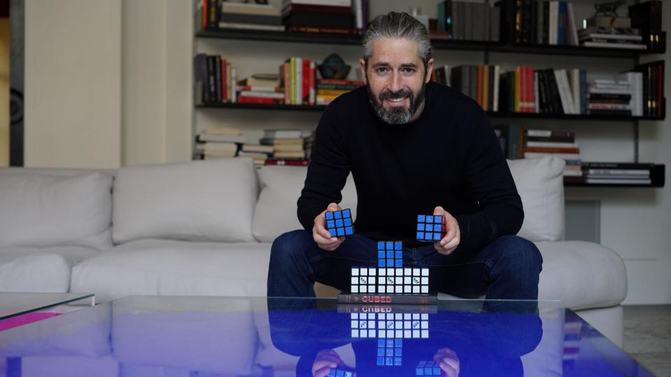 Spin Master co-founder and co-CEO Ronnen Harary with a collection of Rubik's Cube games.