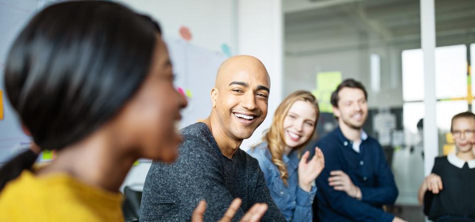 Business team smiling during a meeting