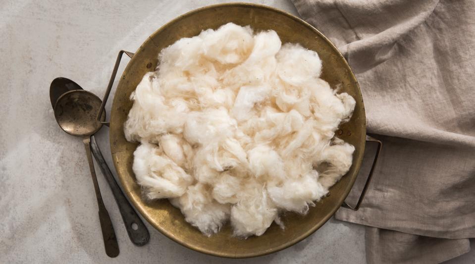 A bowl of organic cotton.