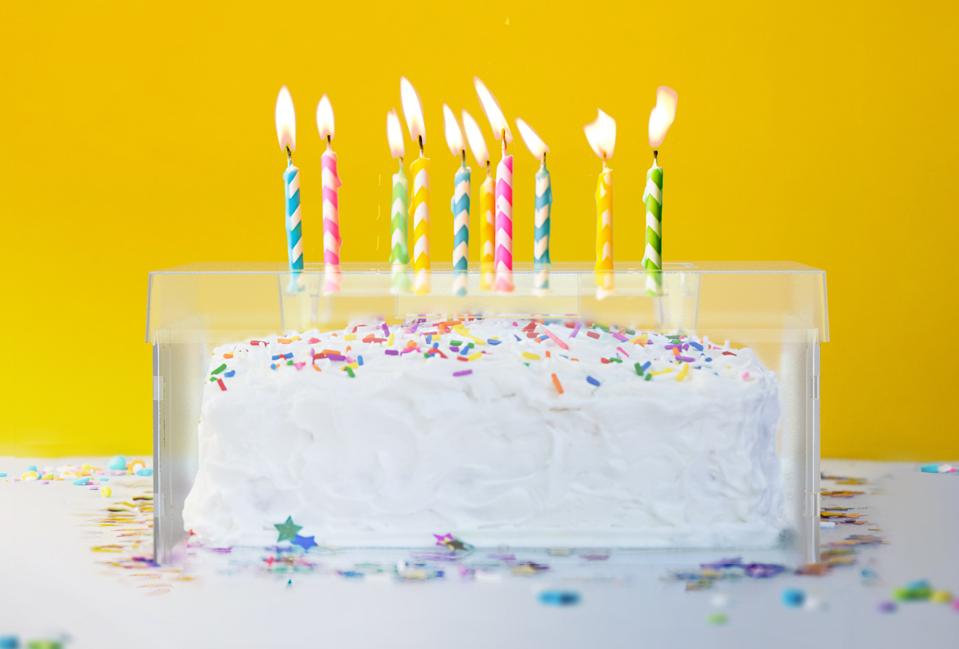 The Top It cake shield makes it safe to blow out birthday candles without spreading germs.