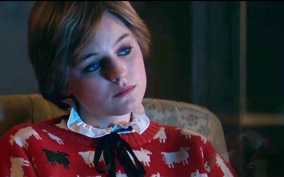 Emma Corrin as Diana, wearing the Princess' iconic sheep jumper