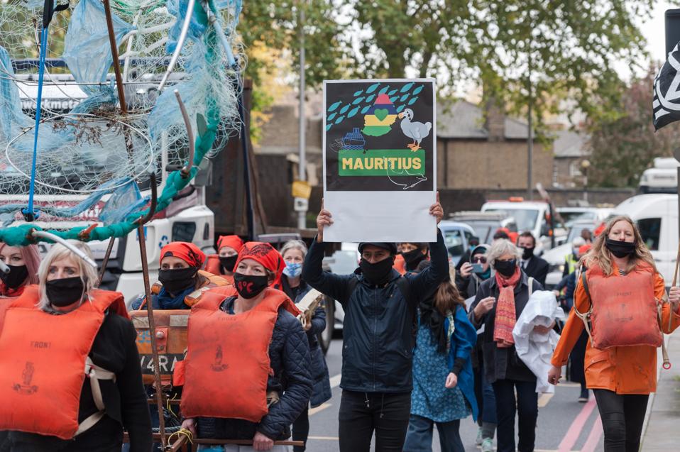 The Wakashio oil spill has galvanized protests around the world. Seen here, protestors outside the IMO in London.