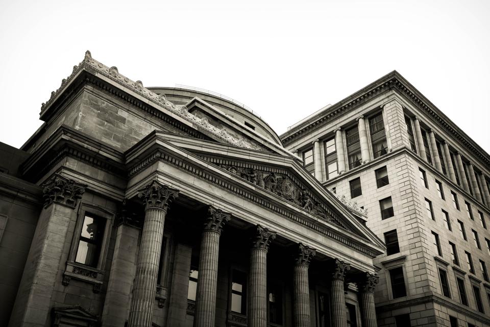 black and white photo of a banking institution.