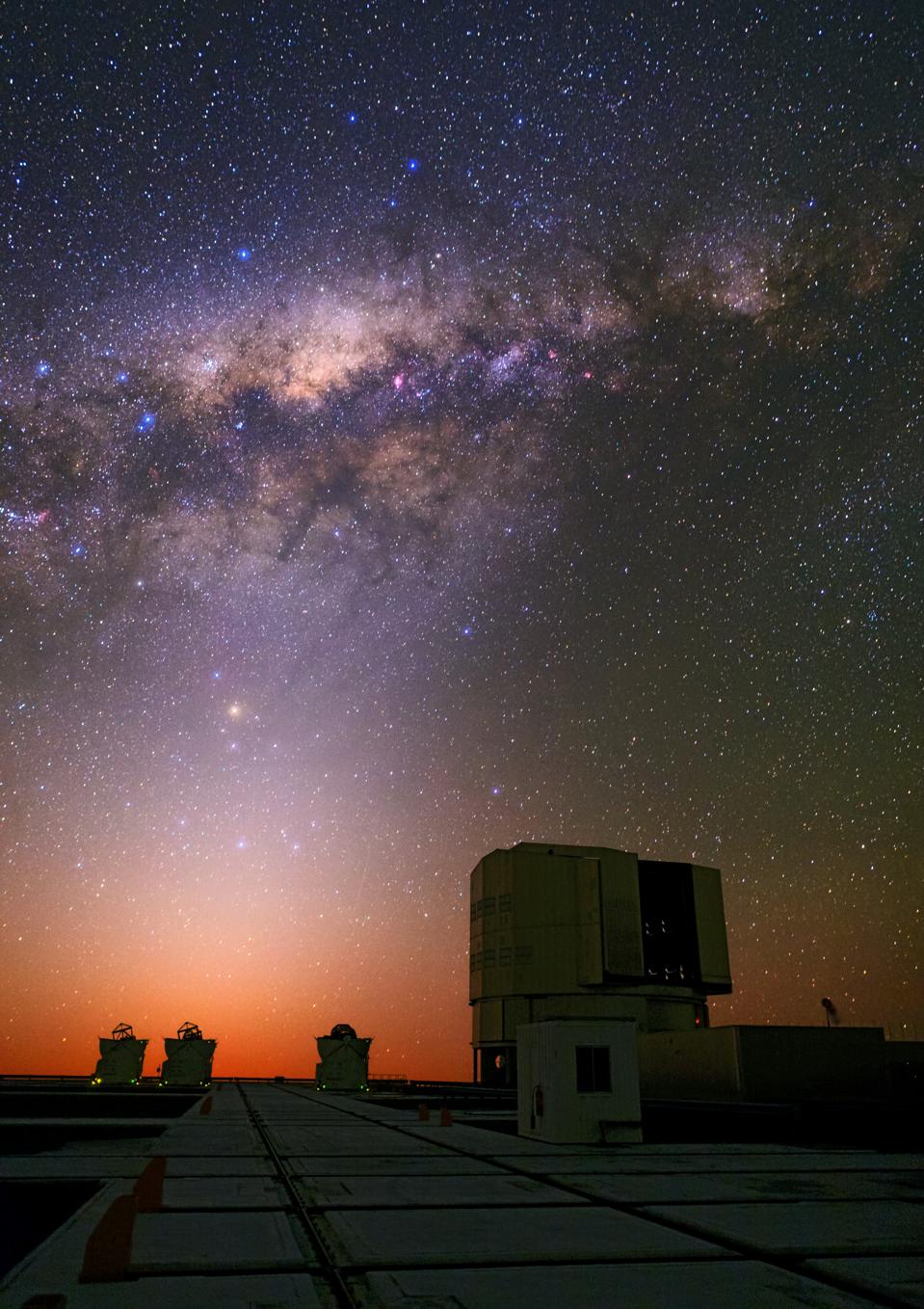 The Milky Way and the night sky's light are joined by the zodiacal light in this photo.
