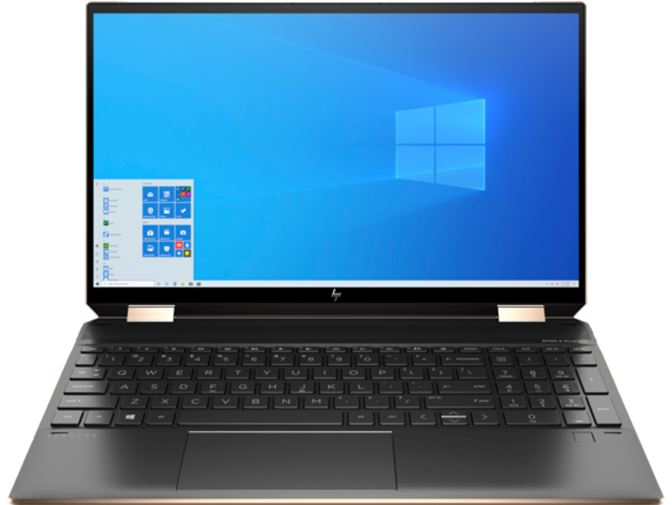 A photo of the HP Spectre x360 laptop opened and running Windows 10.
