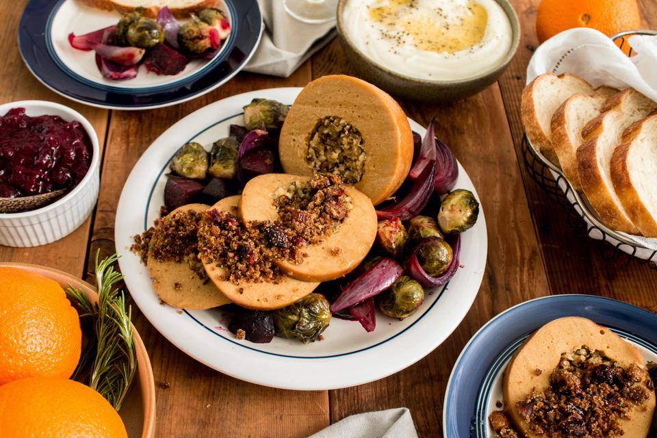 A Tofurky holiday roast is filled with a wild rice and breadcrumb stuffing, to mimic a Thanksgiving turkey.