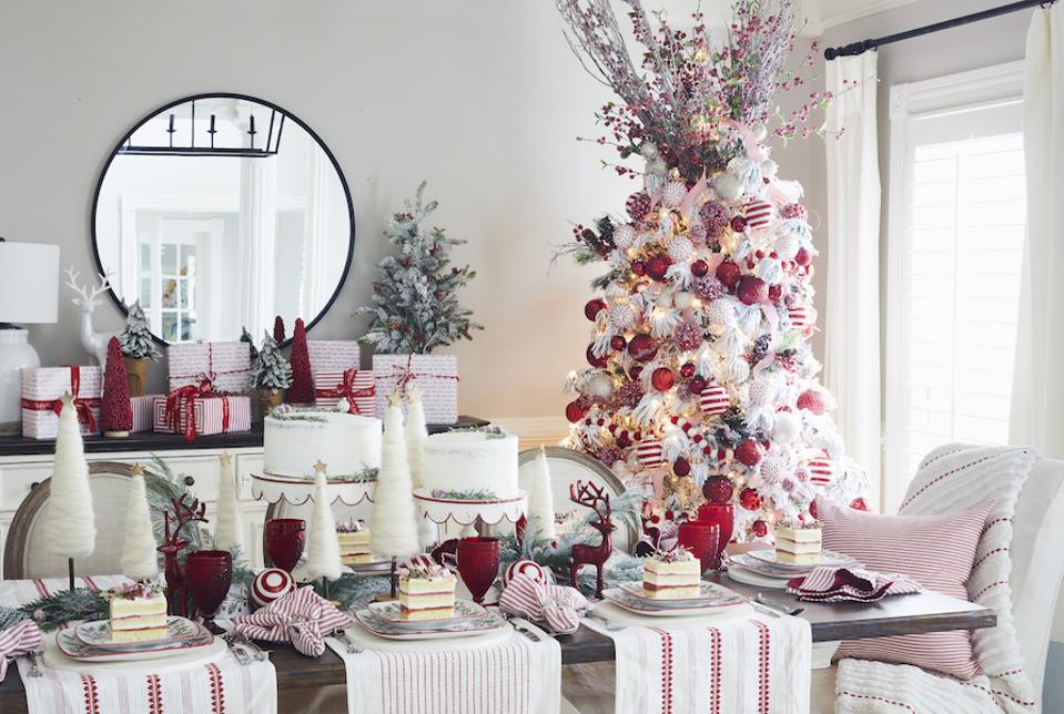 A Christmas tree and decorated holiday table