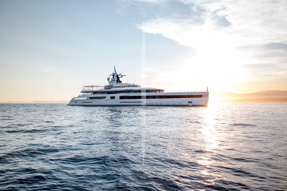Lady S superyacht sails on the ocean at sunset