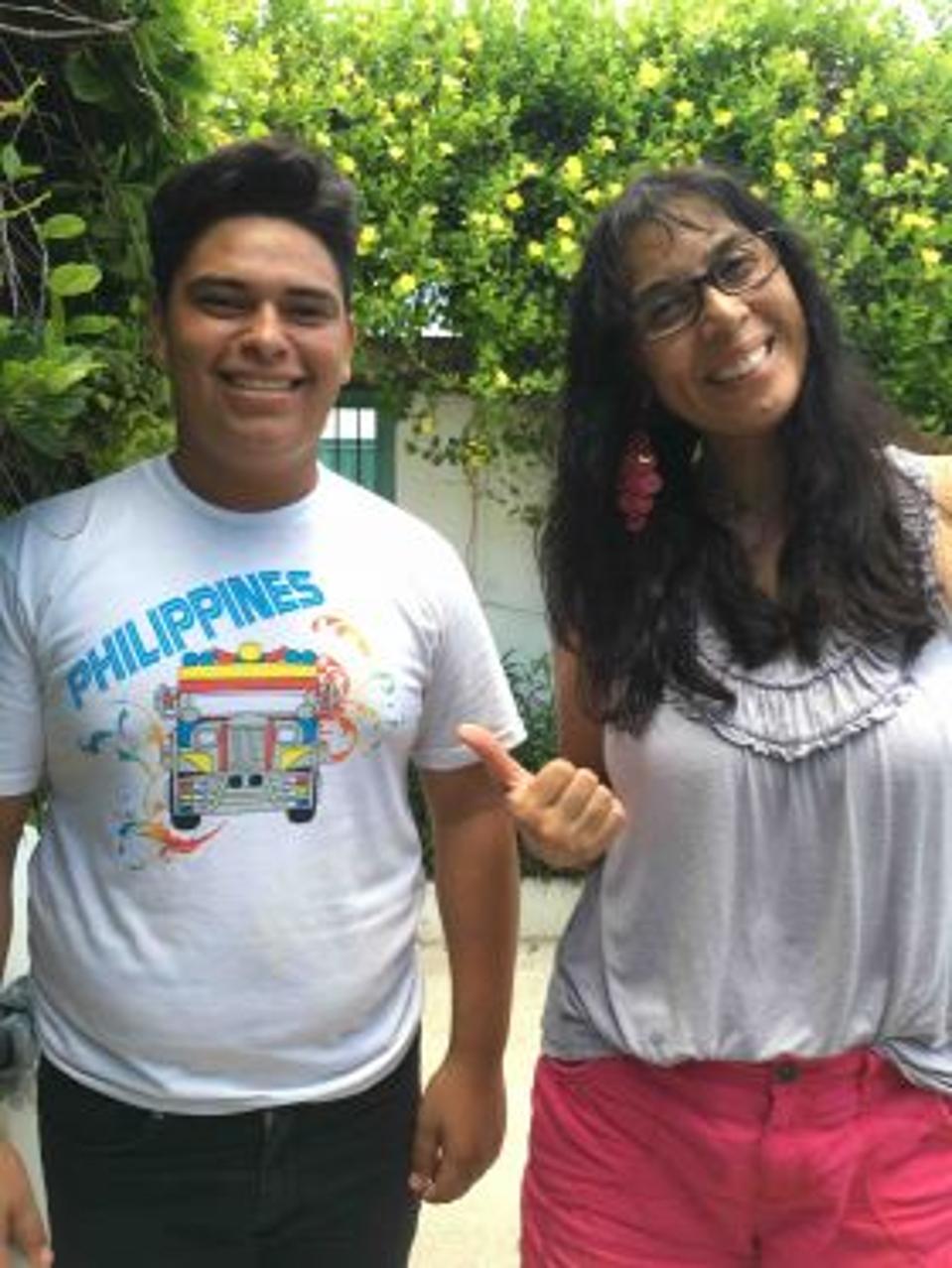 Jet Metier with young Mexican man in Mexico with Philippines t-shirt