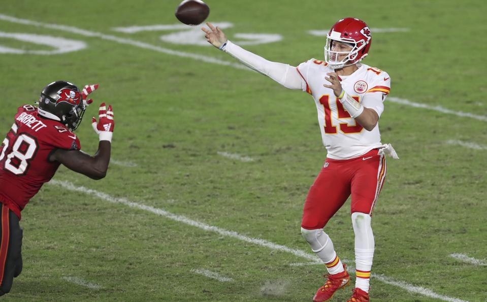Kansas City Chiefs quarterback Patrick Mahomes completes a pass.