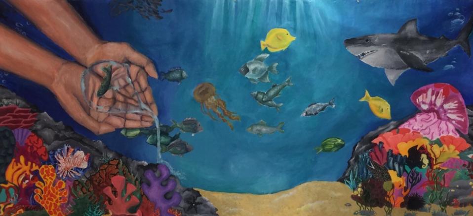 A mural, created by students at Smithtown High School East in St. James, N.Y., hangs in the local town hall.