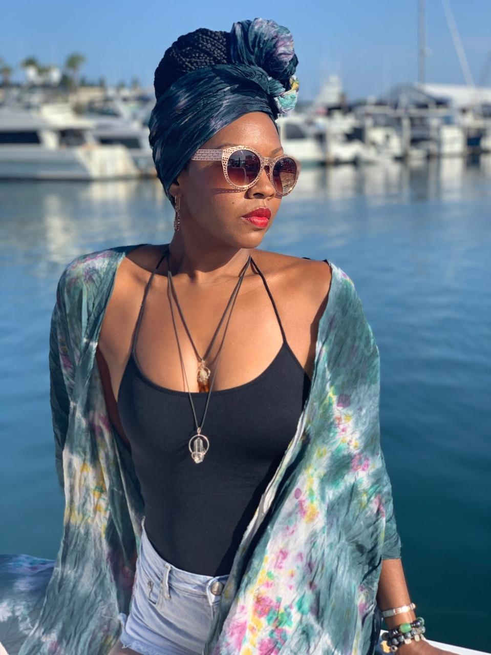 woman wearing scarf and cardigan