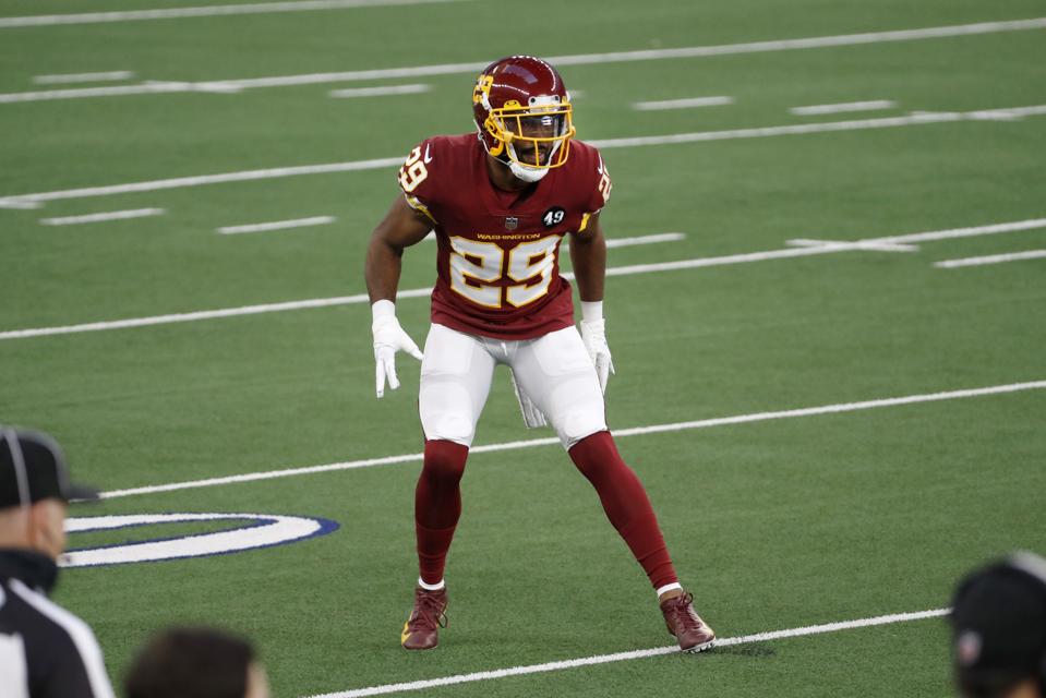Washington Football Team cornerback Kendall Fuller drops into pass coverage during the first half of an NFL football game against the Dallas Cowboys in Arlington, Texas, Thursday, Nov. 26, 2020. (AP Photo/Roger Steinman)