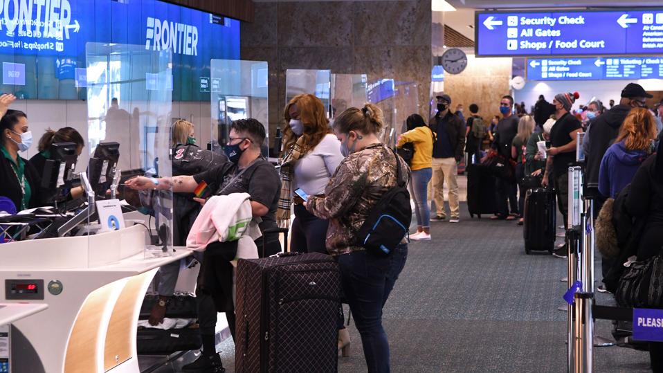People Travel For Thanksgiving Despite CDC Warnings