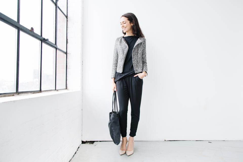 woman by window modeling clothing