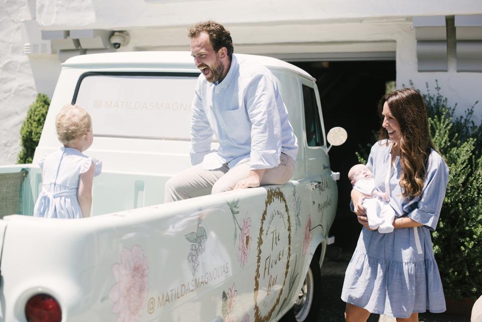 Matt and Emily with their vintage Ford (1961) Econoline turned mobile flowerbar.